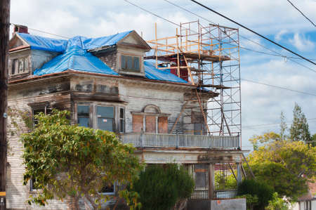 Astoria,Oregon,USA - September 13,2015: Harry Flavel house.  After years of neglect by owner Harry Flavel who died in 2010, a decendant of Captian George Flavel, it appears to be getting a much needed restoration.のeditorial素材