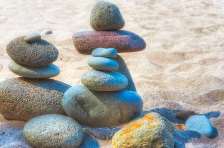 At Oxbow Park, alongd the Sandy River, has a beach where rocks are staked by anyone who visits the area creating a village of stacked rocks.の写真素材