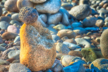 At Oxbow Park, alongd the Sandy River, has a beach where rocks are staked by anyone who visits the area creating a village of stacked rocks.の写真素材