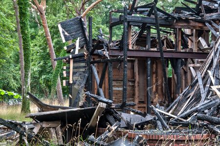 Burnt old wooden houseの写真素材