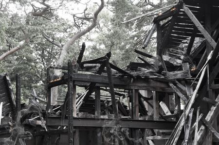 Burnt old wooden houseの写真素材