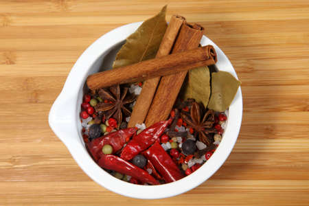 mixed spices in a mortarの写真素材