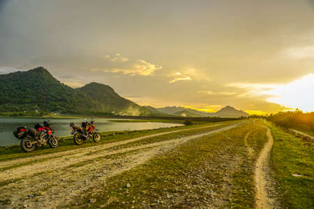 Purwakarta, West Java, Indonesia (03/30/2018) : Purwakarta, West Java, Indonesia (03/30/2018) : The rider is touring with his motorcycle through the Jatiluhur Dam side which is commonly called Parang Gombongのeditorial素材