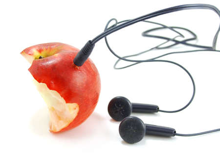 Half bitten apple with earphones like mp3 player. Isolated