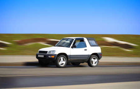 pretty suv in motion の写真素材