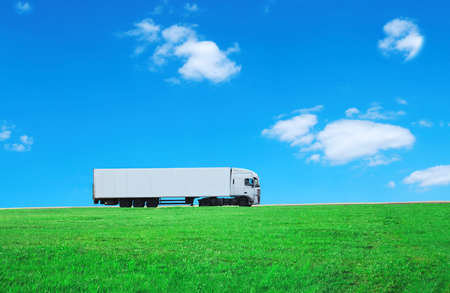 white truck on sky and field background