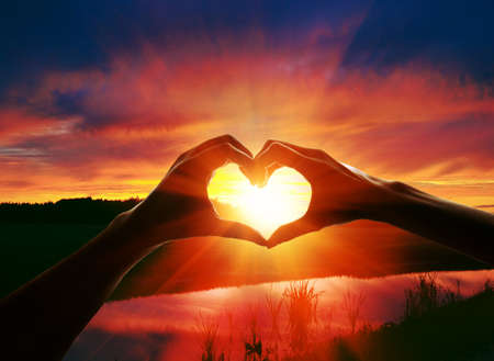hands in shape of love heartの写真素材