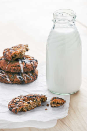 bottle of milk with cookiesの写真素材