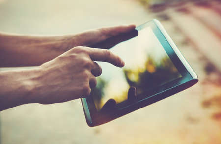 hands holding digital tablet pc
