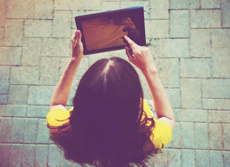 hands holding digital tablet pcの写真素材