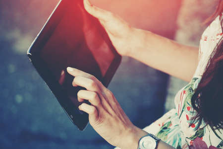 hands holding digital tablet pcの写真素材