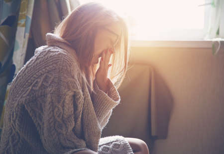 pretty woman waking up and yawningの写真素材