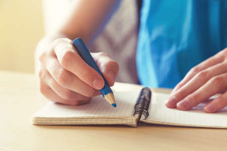hand writing with colorful pencilの写真素材