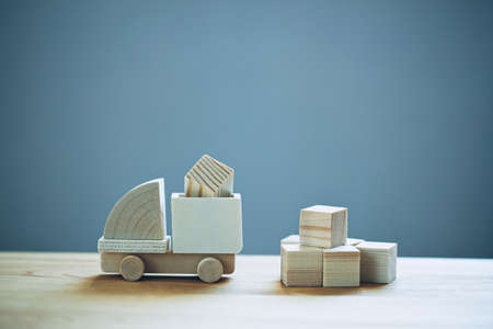Wooden model of truck loading freight. Shipping and delivery conceptの写真素材