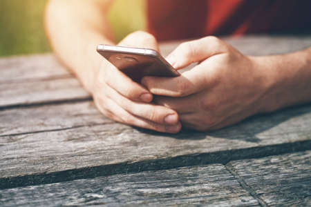Hands using smart phone touching screen with fingers