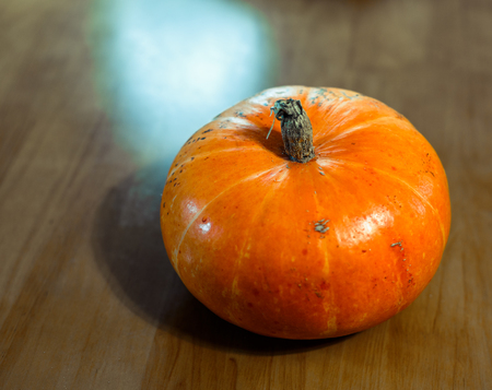 Pumpkin on the wooden table. Healthy eatingの写真素材