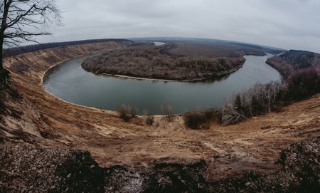 Natural autumn landscape with sandy slopes and the riverの写真素材