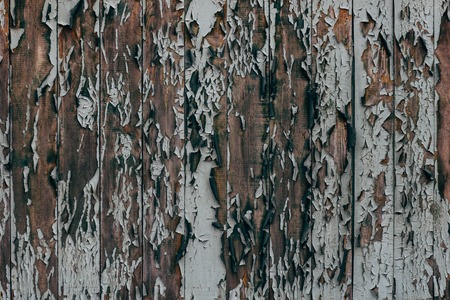 Old wooden boards with shabby paint. Background with vertical lines.の写真素材