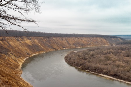 Natural autumn landscape with sandy slopes and the riverの写真素材