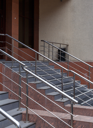 staircase with iron railing in the modern houseの写真素材