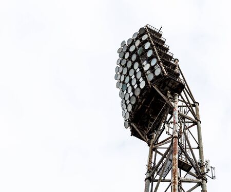 Spotlight stadium light view from below against the background of a bright sky. Lanternsの写真素材