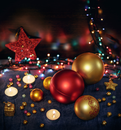 Christmas Toned blurred background with festive decoration. Christmas balls, candels, star, lights. Copy spaceの写真素材