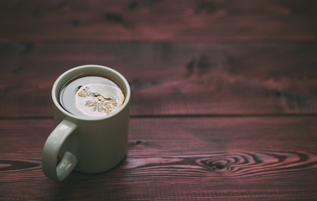 cup of tea with a slice of lemon on a wooden table. Background, space for text, copyspaceの写真素材
