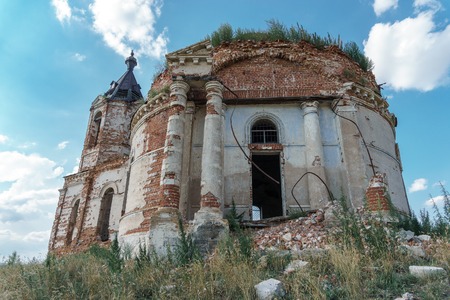 The ruins of an abandoned old castle or manor, or mansion, or churchの写真素材