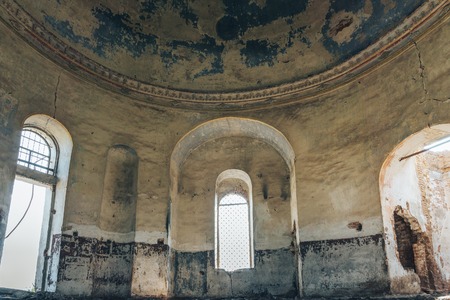 Abandoned mansion, hall, inside view. Forgotten religion conceptの写真素材