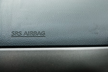 The inscription "SRS Airbag" on dashboard inside the car. Safety in the car conceptの写真素材