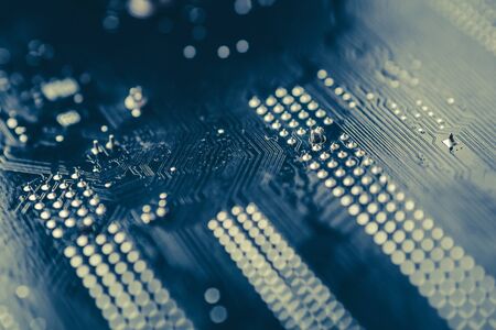 Tech science background. Circuit board. Electronic computer hardware technology. Toned image, macro photoの写真素材