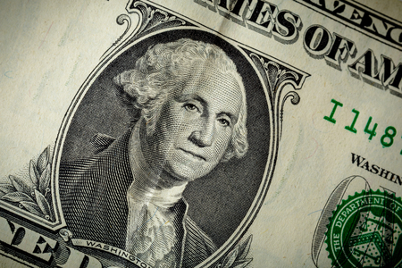 George Washington portrait on the USA one dollar banknote. Macro photo of cash money