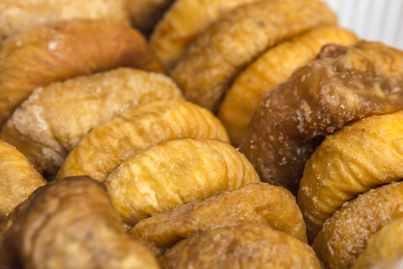 Dried figs stacked together close upの写真素材