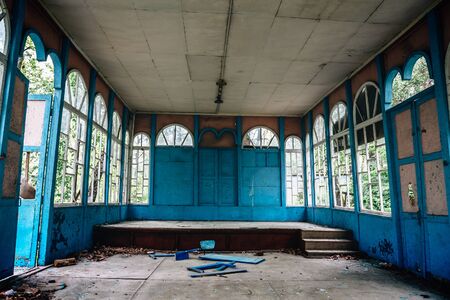 Concert hall with large windows, an old shuffled abandoned building, interior insideの写真素材