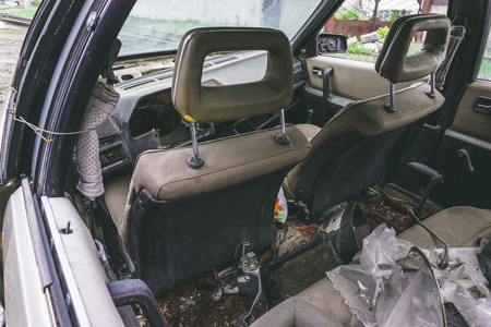 Salon of an old broken abandoned car, car left after an accidentの写真素材