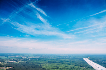 Aerial view from plane, beautiful sky and earthの写真素材