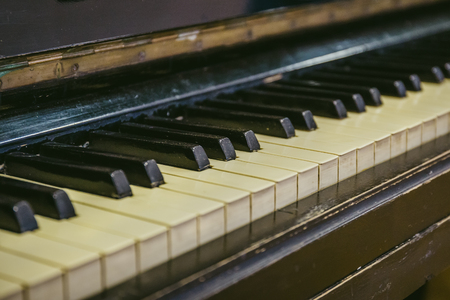 Opened old retro piano keyboard, vintage tonedの写真素材