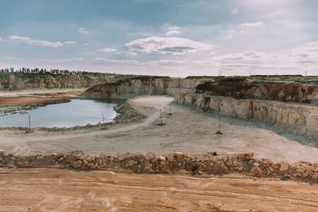 Mining quarry, panorama of industrial landscape, toned