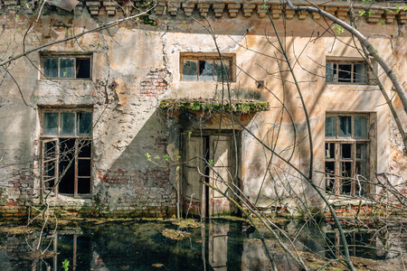 Abandoned building exterior, Water-flooded houseの写真素材