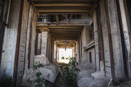 Abandoned industrial building, corridor view, tunnel view, perspective