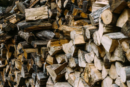 Firewood, selective focus, wooden background