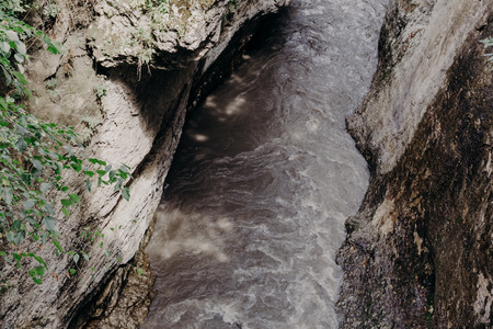 Gorge of a mountain river among rocks, top viewの写真素材