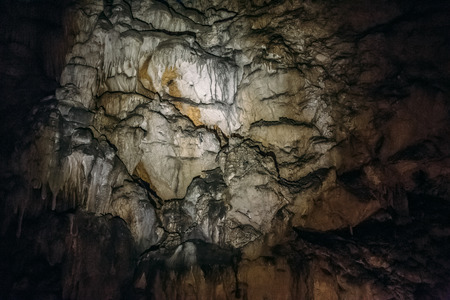 Underground cave interior, stoned formations on ceilingの写真素材