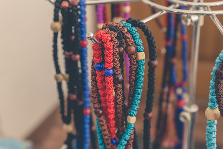 Handcrafted or handmade jewellery - necklace or bead, selective focusの写真素材