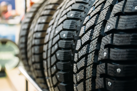 New winter tires for sale in store, selective focus