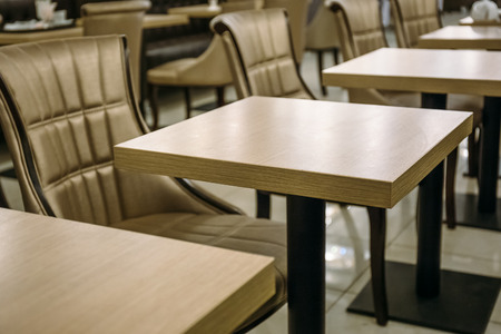 Empty coffee room with tables and chairs, toned, selective focus