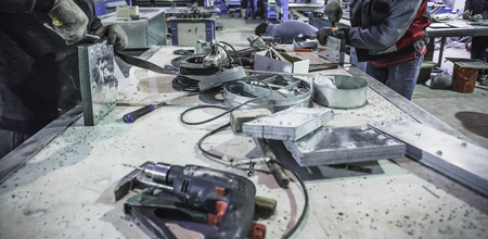 Factory manufacturing of modern metalworking production of industrial steel ventilation air systems,...