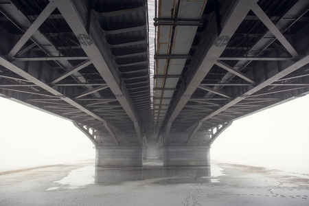 View under Bridge in Fog, mysterious mood, perspectiveの写真素材