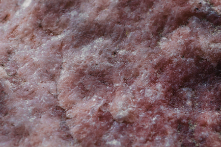 Wild marble stone surface texture, as abstract geologic background, macro photoの写真素材