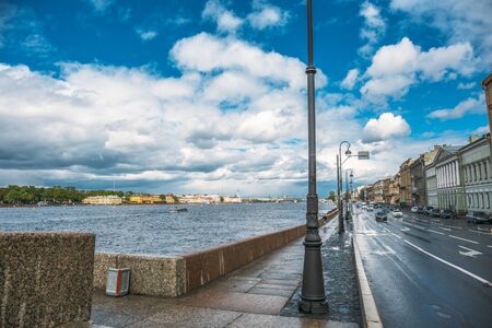 Saint Petersburg, Russia - Circa June 2017: Embankment of St. Petersburg, cars, traffic, the Neva River, a bright blue sky after a summer rainのeditorial素材